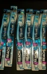 6 X Reach Total Care + Whitening Toothbrush Clean & Soft Light Blue. Fixed Price $66.86.