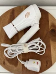T3 Micro Featherweight Compact Folding Dryer White Model 76851. Fixed Price $39.99.