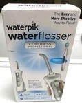 Sealed Waterpik Waterflosser Professional Cordless Model WP-440C. Fixed Price $25.00.