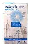 Waterpik Waterflosser W/ 2 Tips Cordless White New In Open Box. Fixed Price $26.50.
