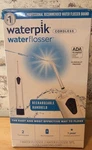 Waterpik Cordless Flosser White Includes 2 Jet Tips 360W, Open Box.. Fixed Price $16.95.
