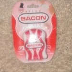 Accoutrements Bacon Floss Waxed Dental Red White 27 Yards Model 11847. Fixed Price $30.00.