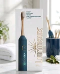 Sealed Lumineux Electric Toothbrush With Eco-friendly Bamboo Heads. Fixed Price $31.49.
