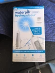 Waterpik WF-03CD010 Cordless Freedom New Unopened. Fixed Price $25.99.