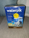 Waterpik White Ultra Flosser With 6 Flossing Tips WP-100W New & Sealed. Fixed Price $39.99.