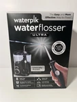 Waterpik Waterflosser Ultra Black WP-114W 8 Tips Included 10 Pressure Settings. Fixed Price $65.00.