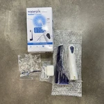 Waterpik WP360W Cordless Flosser Rechargeable New In Open Box. Fixed Price $24.47.