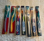 Lot 7 Oral B Colgate Manual Soft/extra. Fixed Price $15.00.