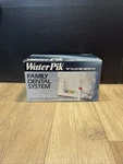 New Old Stock 1989 Vintage Waterpik Family Dental System W/box & 4 Tips Teledyne. Fixed Price $40.00.