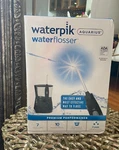 Aquarius Waterpik Waterflosser New Box Electric Power With 10 Settings. Fixed Price $67.00.