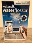 Waterpik Ultra Flosser Model WP-100. Fixed Price $35.00.