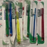 6 Vintage Butler Gum Toothbrushes #411 Soft Full Size Head 1980S Sealed. Fixed Price $28.00.