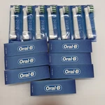 Lot Of 14 Oral Pro Cross Action Toothbrush Heads Genuine Replacement. Fixed Price $27.99.