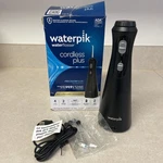 Open Box Waterpik Waterflosser Cordless Plus, Ultra Quiet, Tips, Black WP-462W. Fixed Price $34.99.