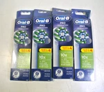 (4) Oral-b Cross Action White Replacement Heads 4-PACK Damaged Package. Fixed Price $32.99.