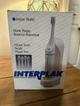 Vintage Interplak Plaque Removal Electric Toothbrush PB-4 Nib Old Stock. Fixed Price $48.00.