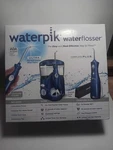 Brand New Waterpik Flosser Ultra Blue WP-113W 12 Tips 10 Settings. Fixed Price $52.99.