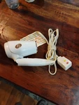 T3 Micro Featherweight Compact Folding Dryer - White Used Works Very Well. Fixed Price $32.00.