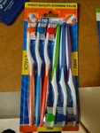 Dr Fresh Multi-color Firm Bristle Toothbrushes With Tongue Scrubber, 6-PACK. Fixed Price $7.99.