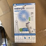 Waterpik Cordless Plus Flosser Rechargeable WP-450W Open, No Tips. Fixed Price $19.50.