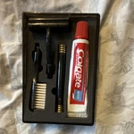 Colgate Travel Kit With Toothbrush, Toothpaste, Militaria Theme. Fixed Price $45.00.