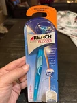 New Blue Reach Access Daily Flosser W/ 8 Disposable Snap-on Heads. Fixed Price $19.99.
