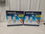 (2) Of Waterpik Ultra Plus Flosser Nano Combo Pack 3978082 Sealed. Fixed Price $88.20.