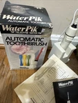 Box Teledyne Water Pik Flosser Appliance Machine Vintage Works. Fixed Price $45.00.