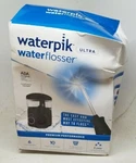 Waterpik Waterflosser Ultra WP-112W Dented. Fixed Price $49.99.