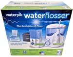 New Waterpik Waterflosser Ultra & Traveler 778082 (factory Sealed). Fixed Price $43.00.