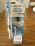 Interplak Opticlean Power Plaque Remover Rechargeable Toothbrush New Sealed. Fixed Price $29.99.