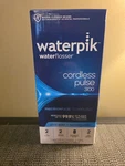Waterpik Waterflosser Cordless Pulse 3100, New Product. Fixed Price $26.00.