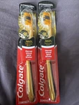 Two Colgate Toothbrush 360 Charcoal Gold Soft Infused Spiral Antigerm Bristles. Fixed Price $7.99.