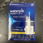Waterpik Sonic-fusion Flossing Toothbrush Electric Flosser Sealed. Fixed Price $119.99.
