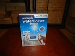 Waterpik, Flosser, Ultra, MODEL#WP-100C, 100% New. Fixed Price $54.88.